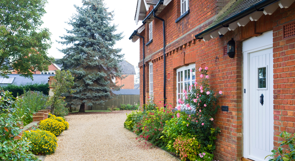 Charming classic country home in Aughton with red-brick façade, sash windows and landscaped garden